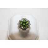 A vintage 9ct gold flower ring set with Diopside gemstones & white stones