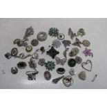 Forty assorted vintage brooches & scarf clips