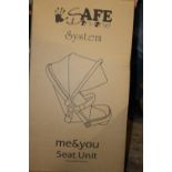 A boxed baby seat