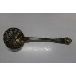 A antique silver & gilt sifter spoon