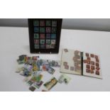 A small framed collection of stamps & a small album containing a qty of Victorian penny red stamps