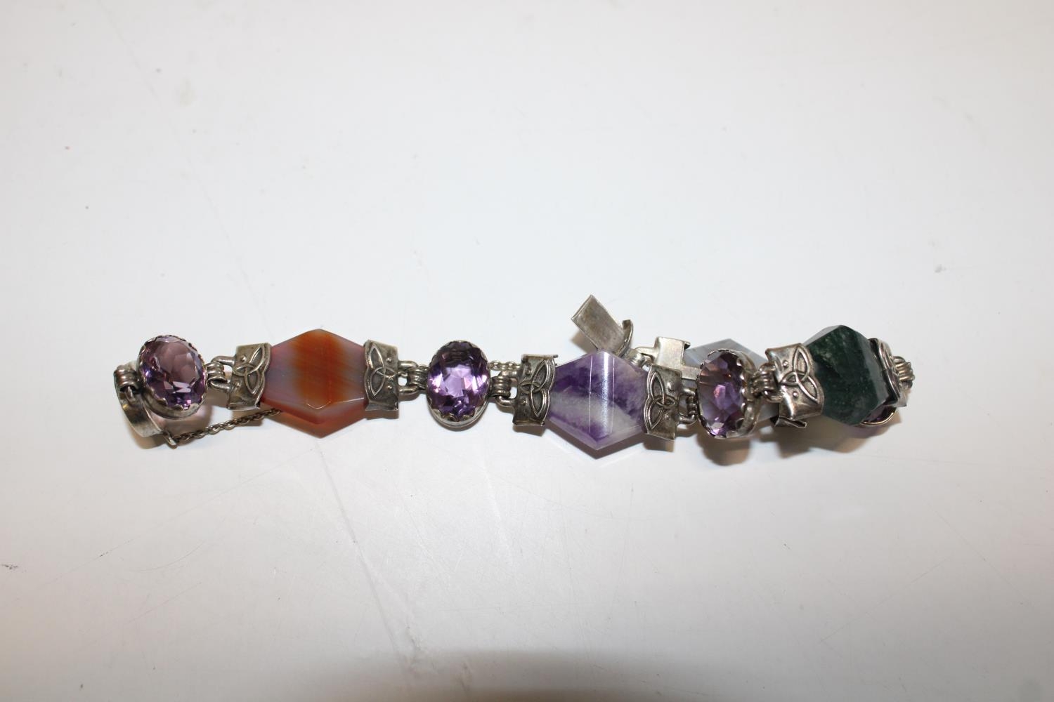 A silver & coloured glass bracelet