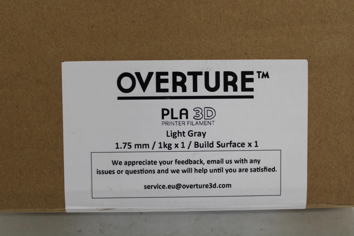 A reel of light grey Overture 3D printer filament