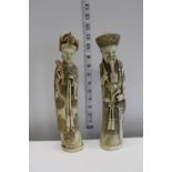 Two Oriental carved figures both signed to the base