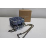 A boxed Harlem Carter blue crystal clutch bag