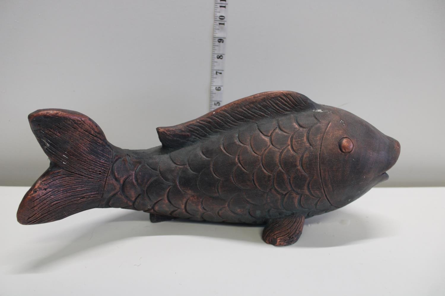 A bronzed ceramic carp study Length 42cm