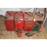 Four vintage metal petrol cans & two oilers