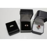 Three costume jewellery boxed rings