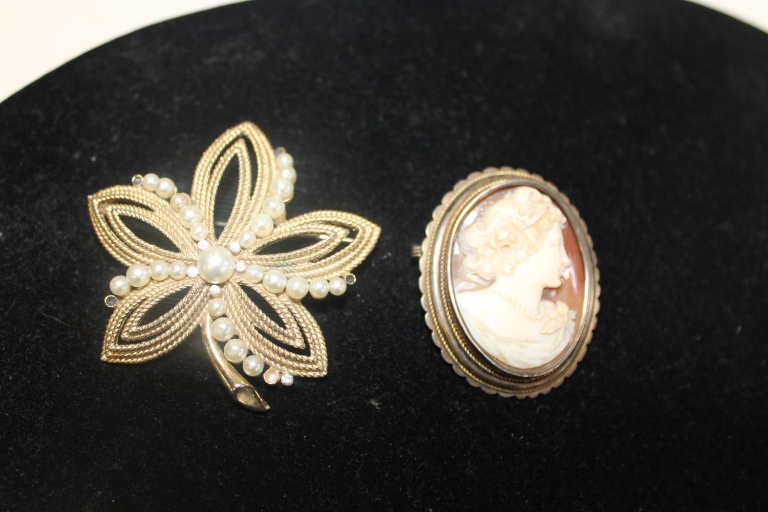 Two vintage costume brooches