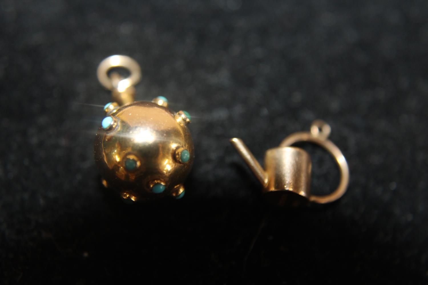 Two 9ct gold pendants/charms 1.89 grams