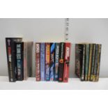 A job lot of James Bond books and a Charlie Higson book signed by the Author.
