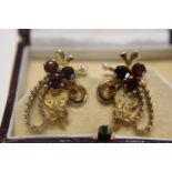 A beautiful pair of hallmarked Edwardian 9ct gold earrings set with red garnets & seed pearls