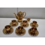 A vintage Wade gold plated coffee set