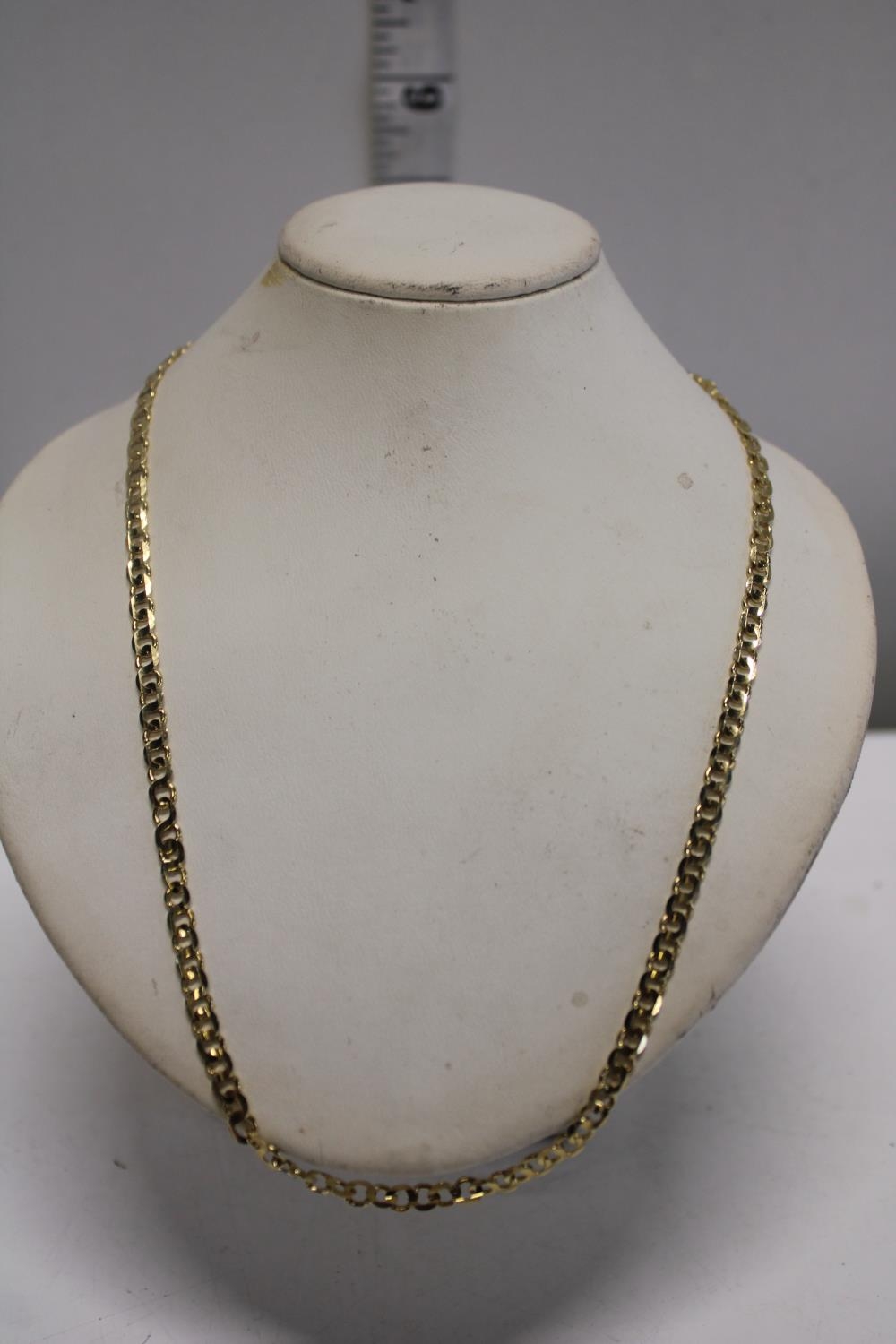 A 9ct gold chain link necklace 46cm in length. 10.09 grams