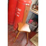 A Wooden Spinning wheel chair. Postage unavailable. 97cm tall