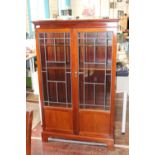 A vintage mahogany display cabinet with lead glazed panels. Postage unavailable. h137cm x