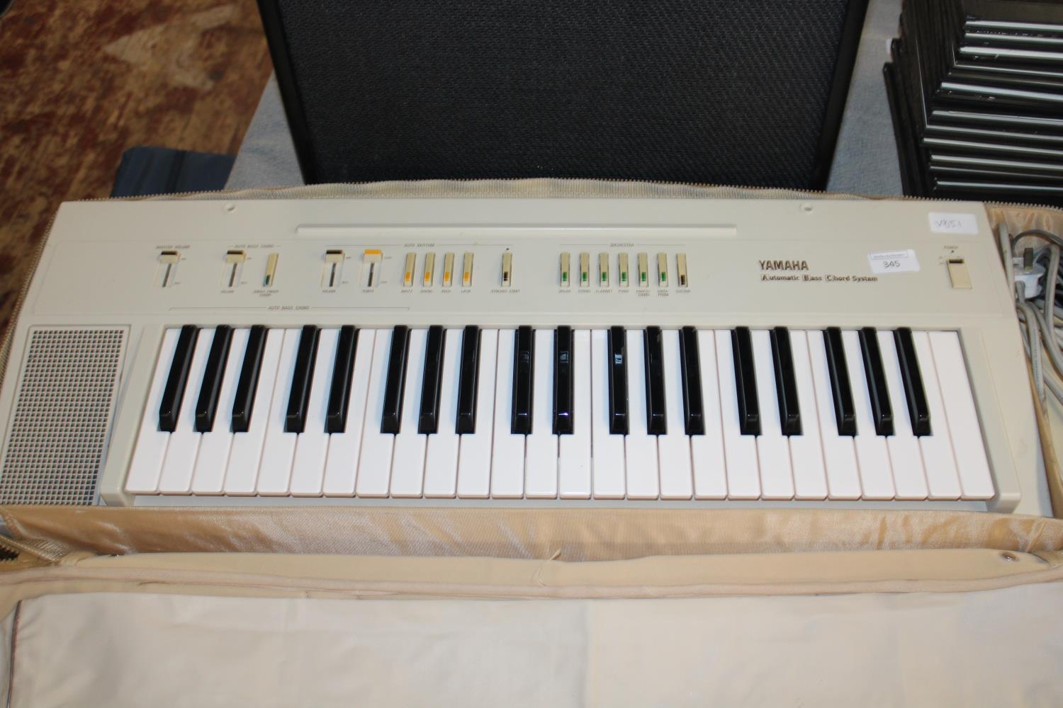 A Yamaha Automatic Bass Chord System keyboard (PS-10) postage unavailable