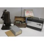 Three vintage film projectors & accessories. Postage unavailable