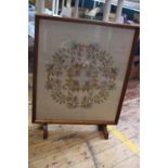 A Framed silk work fire screen. Postage unavailable