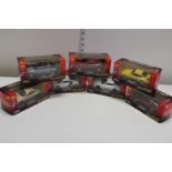 Seven boxed Welly die-cast models