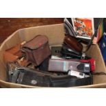 A large qty of vintage cameras & accessories