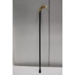 A antique horn handled walking stick. Postage unavailable