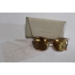 A cased pair of Michael Kors Ladies Sunglasses