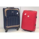 Two pieces of travel luggage. Postage unavailable