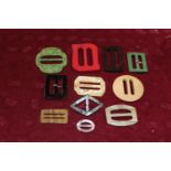 A selection of vintage belt buckles etc