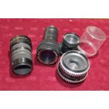 Four assorted camera lenses