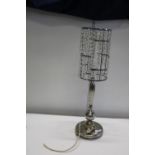 A vintage chrome based table lamp