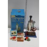 A boxed Wilesco D45 vertical steam engine & accessories