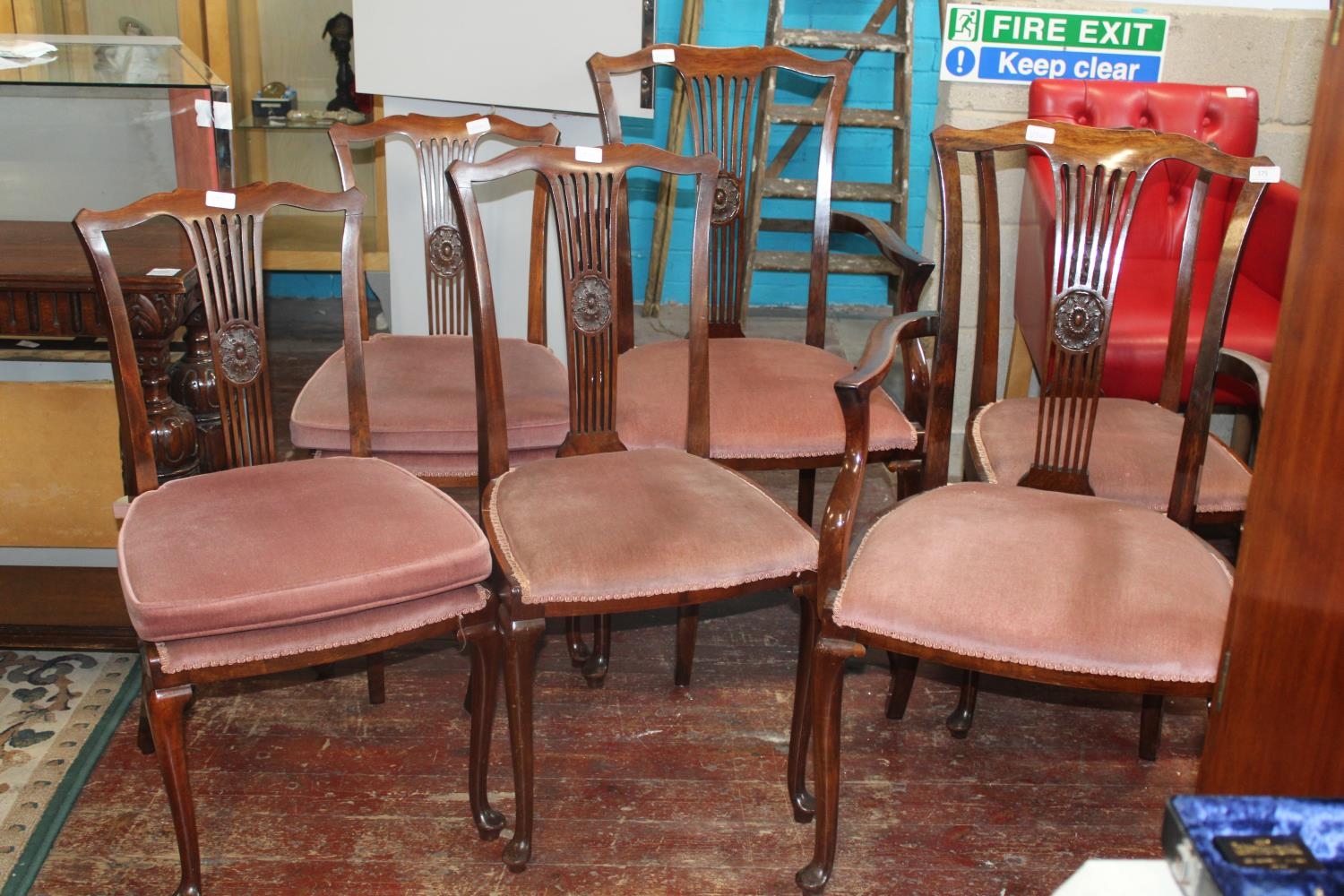 6 Mahogany dining chairs inc 2 Carvers. Postage unavailable