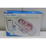 A boxed Mom Med electronic baby scale