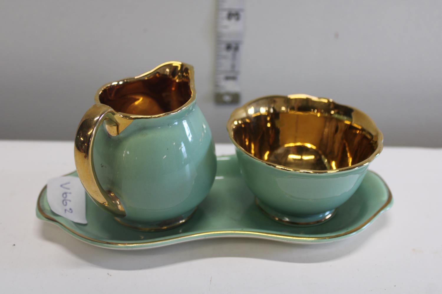 A vintage Crown Devon gold gilt trio