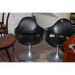 A pair of IMS Italian swivel chairs. Postage unavailable