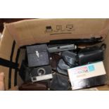 A large qty of vintage cameras & accessories