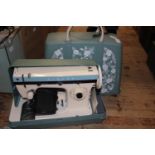 A vintage electric sewing machine. postage unavailable