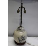 An unusual ceramic & brass table lamp. postage unavailable