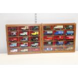 Two glazed display cases & contents of die-cast models