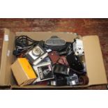 A box of vintage cameras & accessories