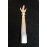 A vintage White Star Line silver plated shellfish opener