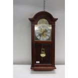 A wooden cased Lincoln Westminster chime wall clock a/f postage unavailable