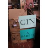 Two boxes of new 'Gin & Bare It' hanging signs
