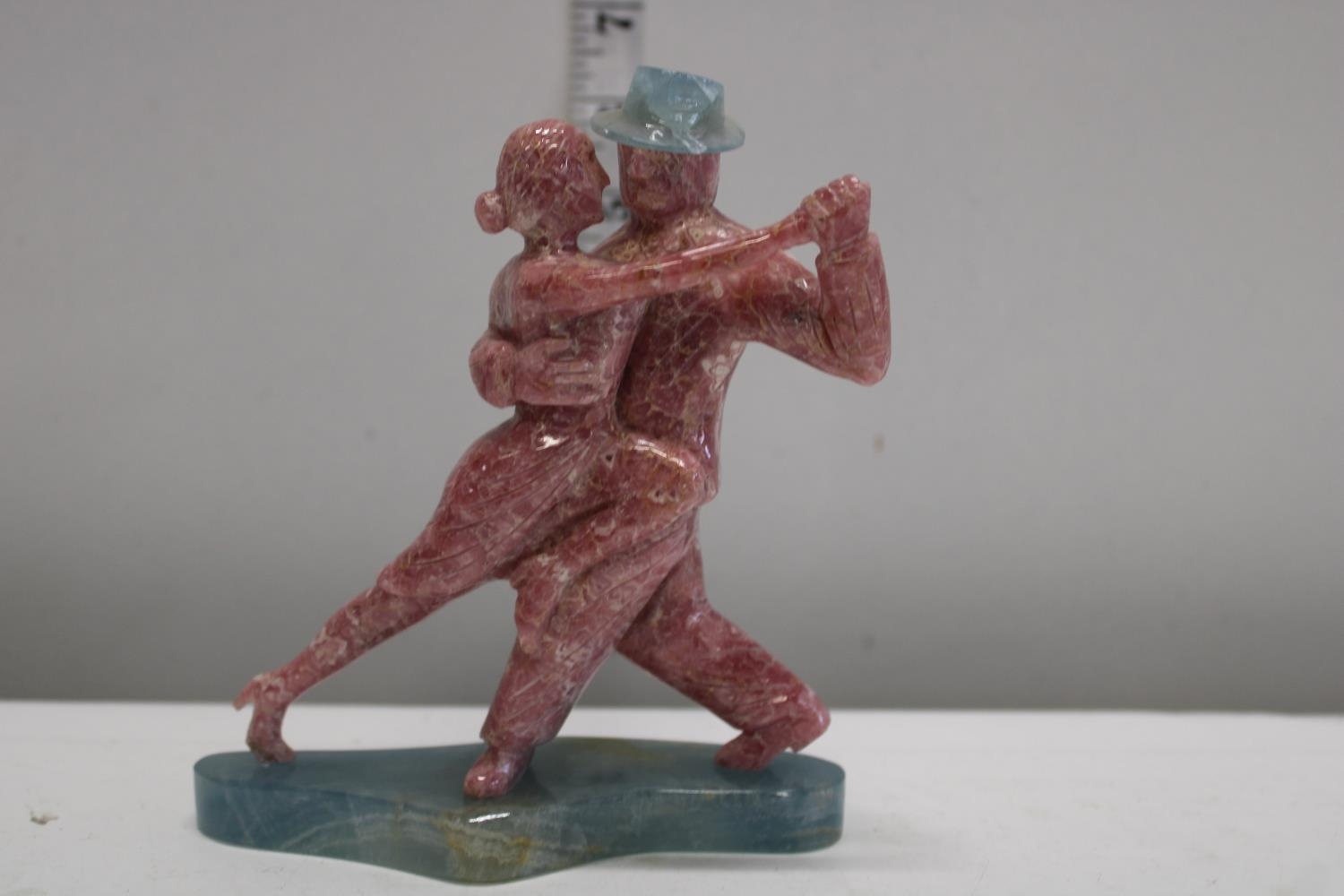 A vintage carved quartz dancing couple