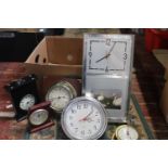 A box of assorted clocks including Smiths etc a/f postage unavailable