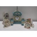 A selection of ceramic mantle clocks a/f