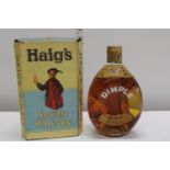 A mid-century 26 2/3 Flo.ozs sealed bottle of Haig's Dimple Scotch Whiskey in original box