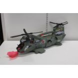 A large toy helicopter model postage unavailable