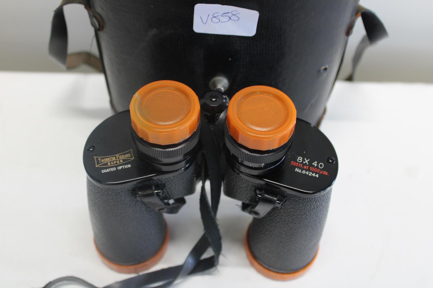 Cased pair of Thornton Pickard binoculars